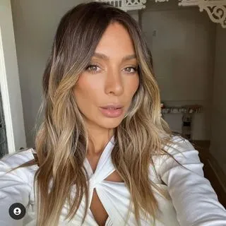 Young beautiful woman taking selfie.