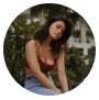 Daniela2 | GoodLike.me | GoodLike.me a woman sitting in a circle